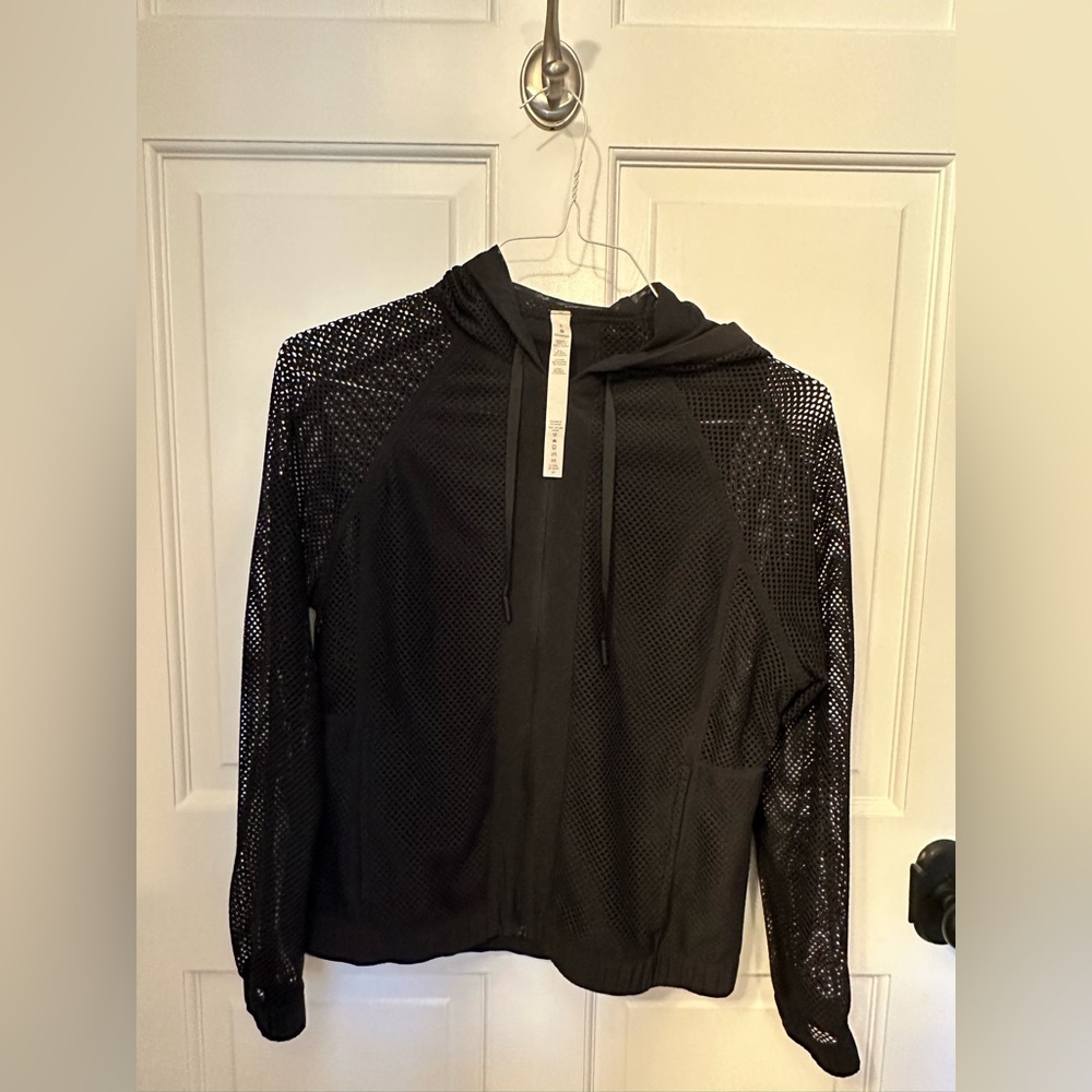 Lululemon mesh on mesh jacket. Lightweight and breathable with front pockets.